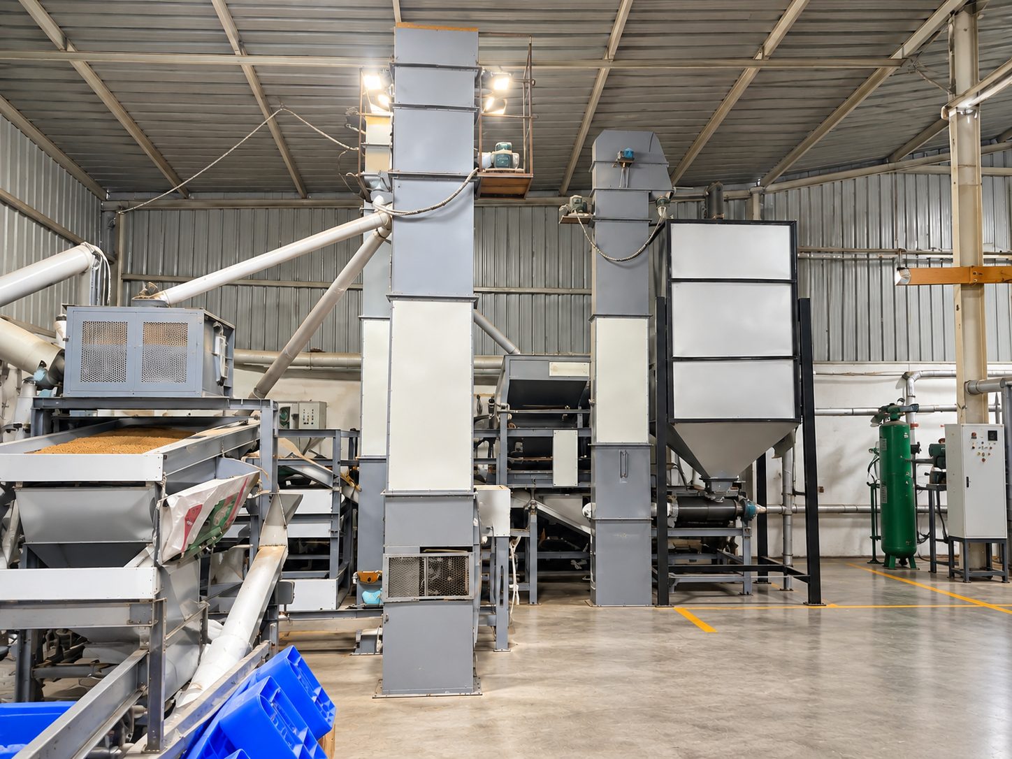 Inside the Even More Foods manufacturing facility — bucket elevators and processing machinery